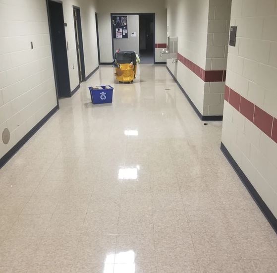 floor wax and maintenance done in hallways
